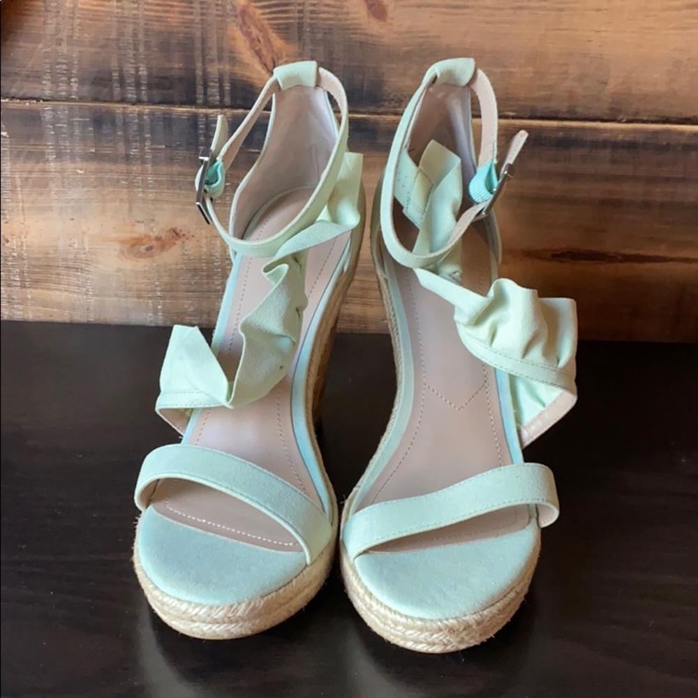 Sea green espadrilles with ruffle details